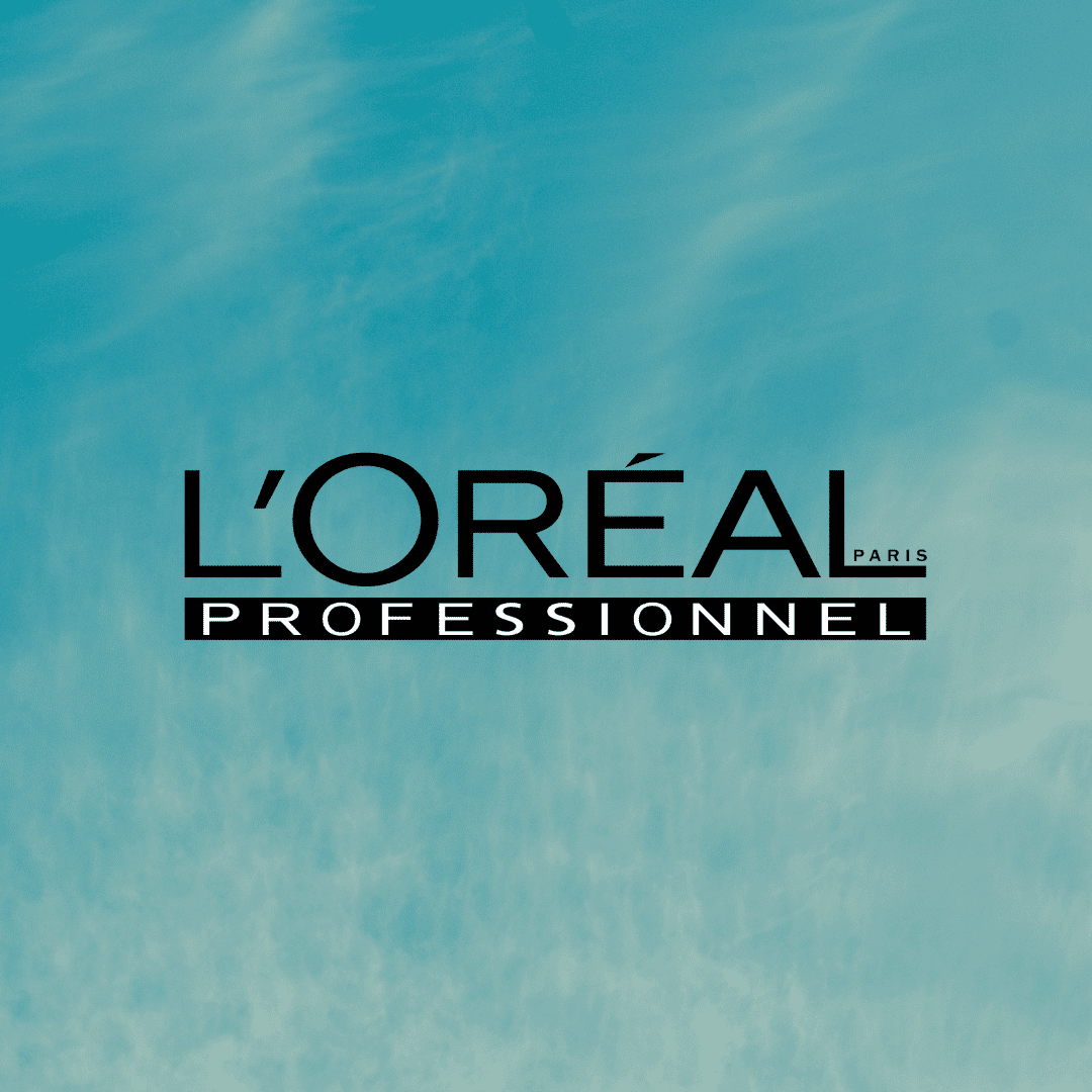 L'Oréal Professionnel logo set against a blue sky background.