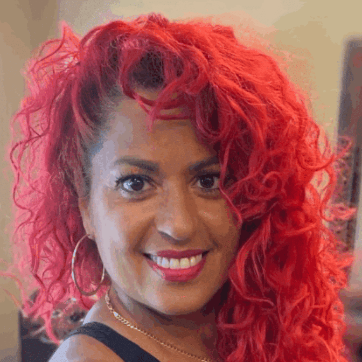 Portrait of Wally Hernandez, a professional stylist at Head 2 Toe, showcasing their expertise and style.