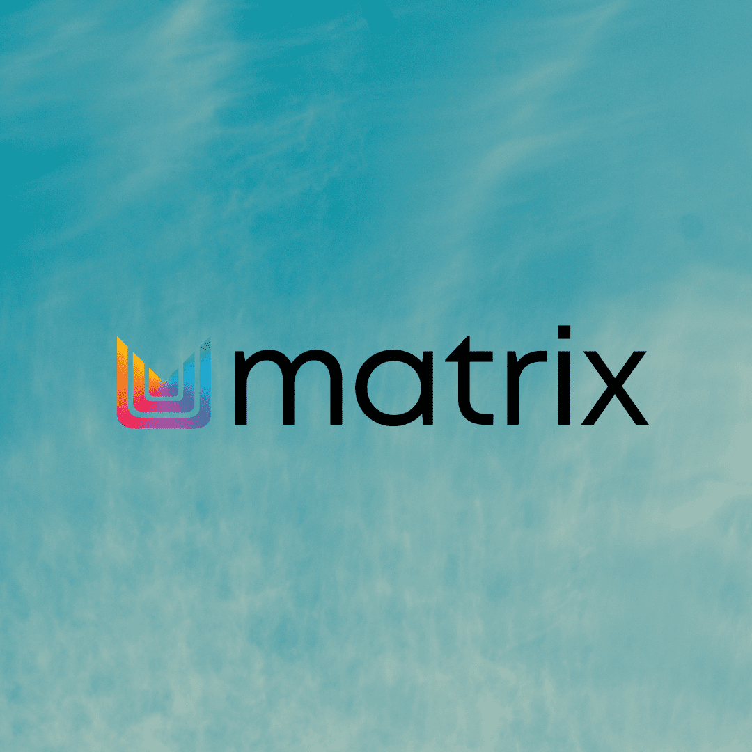 Colorful "matrix" logo on a sky background with light clouds.